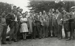 Staff and teenagers pose on the grounds of the Ambloy children's homes during the visit of a British chaplain who was the brother of one of the boys and came to meet him during the Sukkot holiday.