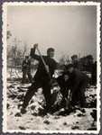 Jewish workers from the Lipa farm labor camp dig in the snow in Cervene Pecky where they were allowed to work for a week in the spring of 1942.