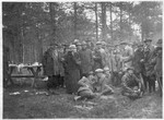 The Kraus family and their friends gather during an outing in the woods in prewar Czechoslovakia.
