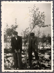 Two Jewish workers from the Lipa farm labor camp dig in the snow in Cervene Pecky where they were allowed to work for a week in the spring of 1942.