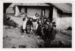 Denise Bloch poses with a group of children in her care [possibly in Perrigueux].