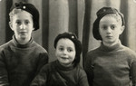 Studio portrait of Yaakov, Schmuel, and Zvi Birnbaum shortly after the war.