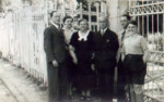Group portrait of a German Jewish family.

Pictured in the center are parents Hedwig and Moritz Oppenheimer, with their children Paul (far left), Elsie (second from left), Hans (second from right) and Fritz (far right).