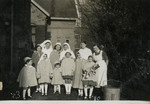 Group portrait of children and nurses in a hospital [probably in Berlin].
