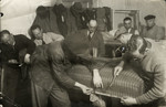 German Jews exiled to Zbaszyn reupholster furniture in a workshop.