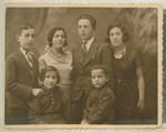 Prewar family photo of the Reichental family.

Moishe (Marian) Reichental is standing second from the right.