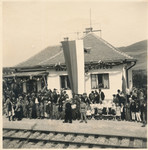 Residents of the town of Hanushovce wait at the train station to greet the arrival of President Jozef Tiiso.
