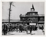 Original caption: "German civilians, selected from all walks of life in nearby Weimar, are marched into Camp Buchenwald.