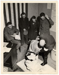 American soldiers oversee a court-martial of German civilians accused of looting.