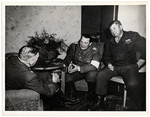 Hermann Goering (center) talks with Brigadier General Robert J.