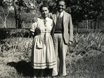 Maurice and Esther Weeg pose together in a garden in India.