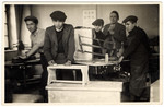 Young religious men work at carpentry shop at a combination yeshiva and vocational training school (hachsharah) in Hlohovec run by Rabbi Moritz Schwartz.