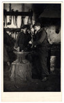 Two young men work at blacksmith shop at a combination yeshiva and vocational training school (hachsharah) in Hlohovec run by Rabbi Moritz Schwartz.