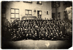 Large group portrait of members of the Lodz ghetto Jewish police.