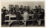 Young men work study religious texts at a combination yeshiva and vocational training school (hachsharah) in Hlohovec run by Rabbi Moritz Schwartz.
