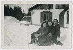 Three Jewish sisters go sledding in Morgins after crossing the border into Switzerland.