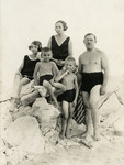 The Brodarics,a Croatian Jewish family, poses on a rocky beach.