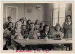 Rose Goldfarb (the donor's mother) teaches a knitting class in the Kassel displaced persons camp.