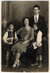 Studio portrait of a Romanian Jewish family.

Pictured are the Leibovitche family.