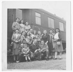 A large group of Jewish displaced persons gathers at the train station in Salzburg.