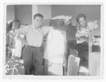 Bernard Pasternak (right) and another man pose in the barrack of an unidentified displaced persons camp.