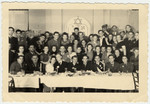 A large group of displaced persons and American soldiers celebrate a wedding in Lindenfels.