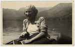 Martha Holzmann takes a boat ride near the Austrian Alps.