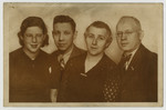Composite photograph sent to Norbert Mueller in England with his face superimposed on a portrait of his three family members still in Germany.