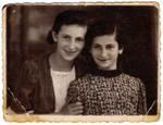 Two Polish Jewish sisters pose for a photograph.

Pictured are Sala and Sima Slomnicki.