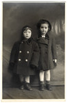 Studio portrait of Katie and Adi Engel taken after after fleeing with their mother to Hungary.