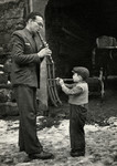 Leo Cohn (father of the donor) teaches his son Ariel  to play the recorder.