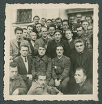 Group portrait of prisoners in Ilag VII, a camp for foreign nationals.