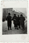 Romanian Jews are forced to clear snow during the winter of 1942 in Brasov, Romania.