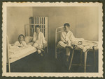 Page from a photo album documenting one day in the life of the Gans brothers, Carl, Manfred and Theo.
