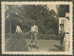 Page from a photo album documenting one day in the life of the Gans brothers, Carl, Manfred and Theo.