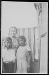 Close-up portrait of Herta Loschinski with her younger siblings Heinz and Ruth.