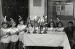 Children in the Jewish orphanage in Lodz celebrate Hannukah in costume.