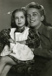 Studio portrait of Dina Buchler with her older cousin and adoptive mother Blanka First.