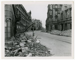 View of a bombed-out street in Munich.

Original caption reads "Munich, May '45."