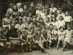 Group portrait of Jewish orphans and employees at the Lodz orphanage, a youth aliyah home.