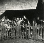 Members of the Zionist youth movement Hashomer Htatzair.pose next to a fence in Yugoslavia.