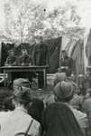 Bosnian partisans hold a meeting in the woods.