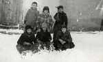 Raul Teitelbaum and his friends play in the snow.
