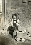 Miriam Steiner plays with her doll shortly before her arrest