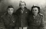 Miriam Steiner with her parents wearing Yugoslav partisan uniforms.