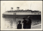The Seligman family  pose in front of the ship that  would take them to the United States.
