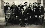 Group portrait of young people in Kisvarda dressed in their Purim costumes.