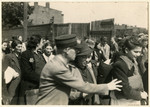 Jewish police escort a group of women who have been rounded up for deportation in the Lodz ghetto.