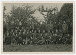 Group portrait of prisoners in Stalag 10 C.

Leopold Guttman is pictured in the top row, center.