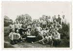 Group portrait of Belgian POWs in Stalag 10 C.

In front is a large pot.